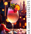 A stunning pink drink with glowing particles against a romantic cityscape. 122382375