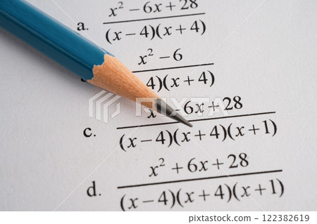 Pencil on mathematic formula exercise test paper in education school. Pencil on mathematic formula exercise test paper in education school. 122382619