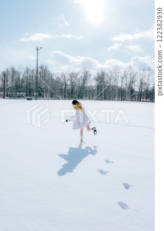 Playing in the snow with her Playing in the snow with her 122382930