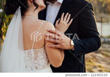 Cute bride couple spend time together after the wedding ceremony Cute bride couple spend time together after the wedding ceremony 122383119