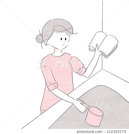 A woman cooking while looking at a recipe 122383274