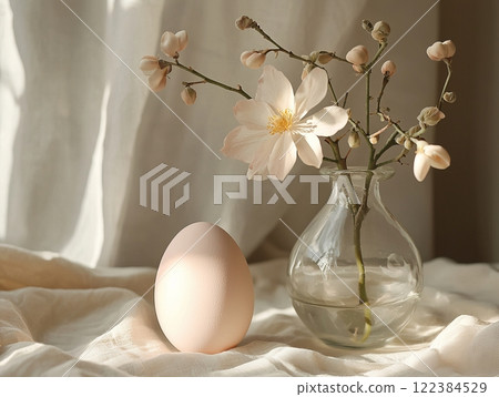 Minimalist still life with a pastel egg and a flower in a glass vase Minimalist still life with a pastel egg and a flower in a glass vase 122384529