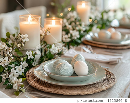 Easter table setting with pastel eggs and candles 122384648