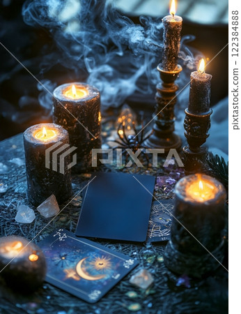 A black mystical table setup with tarot cards 122384888