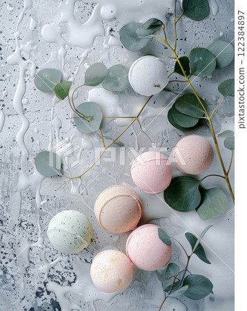 Bath Bombs with Eucalyptus Leaves on Water Surface with Foam Bath Bombs with Eucalyptus Leaves on Water Surface with Foam 122384897