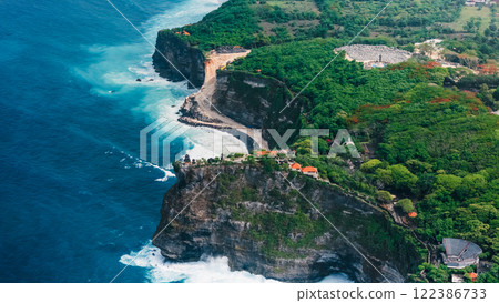 Engineering construction on the cliff near Uluwatu temple in Bali. 122386733
