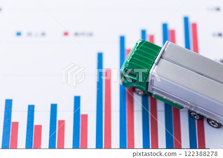 Logistics company performance graph and transportation truck Logistics company performance graph and transportation truck 122388278