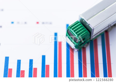 Logistics company performance graph and transportation truck Logistics company performance graph and transportation truck 122388280