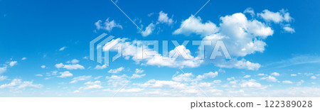 Blue Sky background with tiny Clouds. Panorama background Blue Sky background with tiny Clouds. Panorama background 122389028