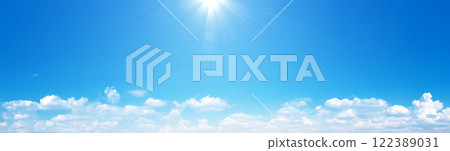 Blue Sky background with tiny Clouds. Panorama sky background Blue Sky background with tiny Clouds. Panorama sky background 122389031