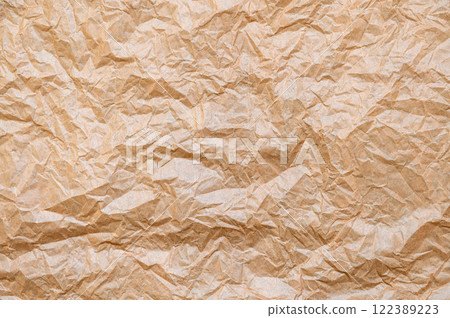 Crumpled kraft paper texture. Grunge texture background. 122389223
