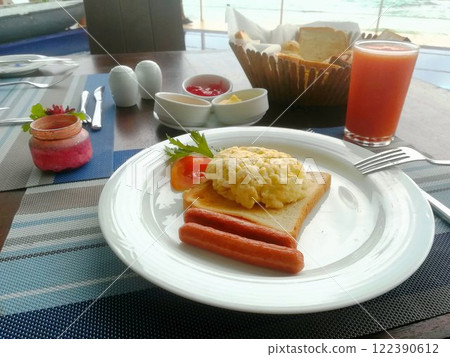 Traditional English breakfast serve with a cup of coffee, in a spa hotel Traditional English breakfast serve with a cup of coffee, in a spa hotel 122390612