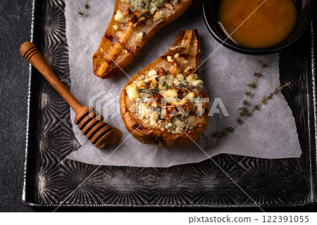 Baked pears with blue cheese and honey Baked pears with blue cheese and honey 122391055