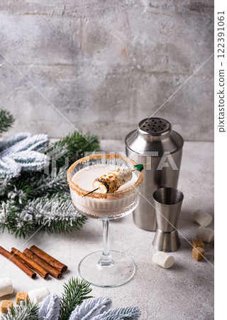 Christmas cocktail with toasted marshmellow Christmas cocktail with toasted marshmellow 122391061