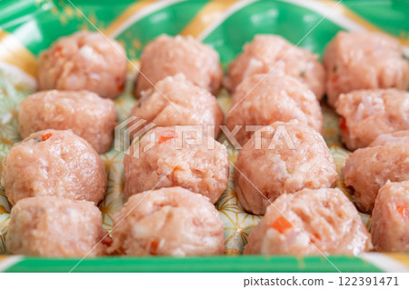 Packed chicken meatballs 122391471