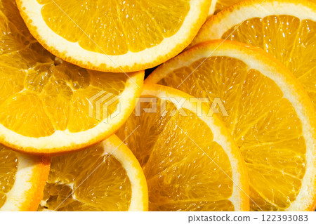 Juicy orange background made from sliced orange Juicy orange background made from sliced orange 122393083