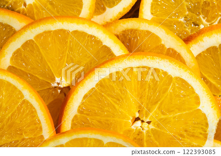 Juicy orange background made from sliced orange Juicy orange background made from sliced orange 122393085