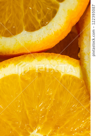 Juicy orange background made from sliced orange Juicy orange background made from sliced orange 122393087