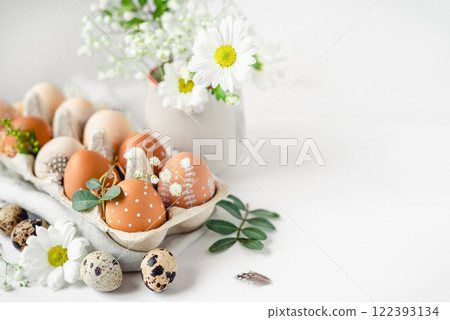 A delicate Easter background with hand-painted eggs 122393134