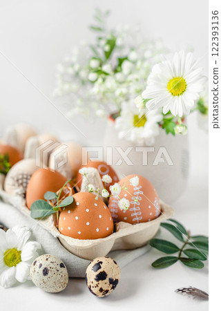 A delicate Easter background with hand-painted eggs A delicate Easter background with hand-painted eggs 122393136