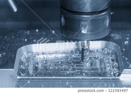 The CNC milling machine cutting press die part by solid bull nose end mill tool. The CNC milling machine cutting press die part by solid bull nose end mill tool. 122393497