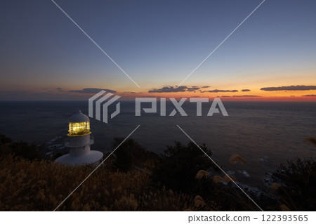 Dawn on the cape with a lighthouse Dawn on the cape with a lighthouse 122393565