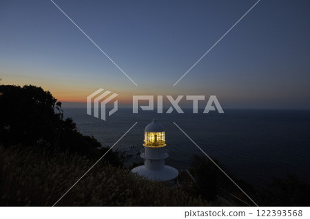 Dawn on the cape with a lighthouse Dawn on the cape with a lighthouse 122393568