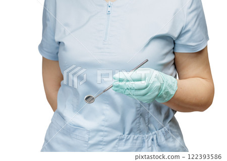 Dentist's hand in glove with mouth mirror. 122393586