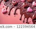 Melted chocolate and pink background 122394564