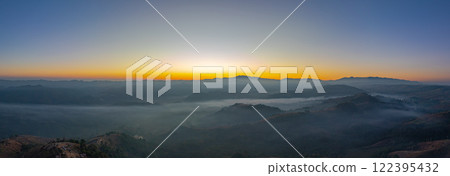 Aerial View of sweet sky in Sunrise in the valley over mist. 122395432