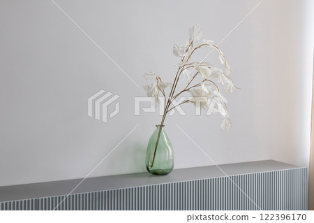 Aesthetic Minimalistic Decor Featuring Dried Branches Beautifully Arranged in a Vase 122396170