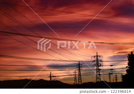 A typical Japanese town skyline with a tangle of steel towers and power lines A typical Japanese town skyline with a tangle of steel towers and power lines 122396814