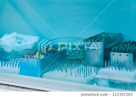 Sterilization of dental instruments. Nozzles for dental drills. Tool for treatment and surgery of teeth. Modern dentistry clinic. 122397265