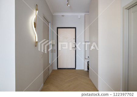 Explore the modern hallway design featuring elegant and stylish lighting options, enhancing decor Explore the modern hallway design featuring elegant and stylish lighting options, enhancing decor 122397702