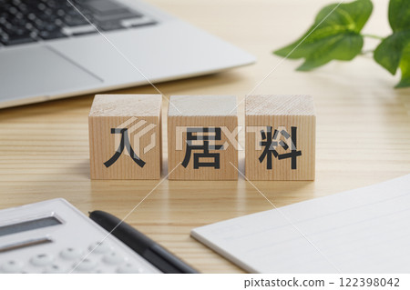A building block with the words "entrance fee" written on it A building block with the words "entrance fee" written on it 122398042