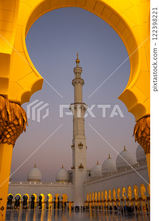 Minaret of Sheikh Zayed Bin Sultan Al Nahyan Mosque Framed by an Opening at Night 122398221
