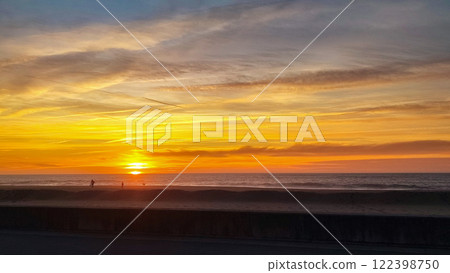 Landscape photo of impressive steep orange cliffs on the Atlantic Ocean coast at sunset. Taken in Espinho, a suburb of Porto, Portugal. Landscape photo of impressive steep orange cliffs on the Atlantic Ocean coast at sunset. Taken in Espinho, a suburb of Porto, Portugal. 122398750