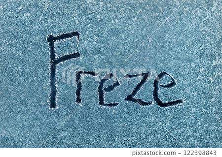 Frosted Surface With Inscription Freeze Captured in a Cold Environment Frosted Surface With Inscription Freeze Captured in a Cold Environment 122398843
