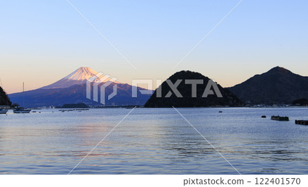 The sunrise of Mt. Fuji from Mitsuhama in Numazu City across Suruga Bay The sunrise of Mt. Fuji from Mitsuhama in Numazu City across Suruga Bay 122401570