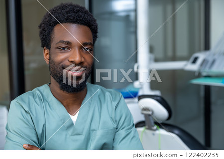 Dentist doctor posing at workplace in modern clinic interior Dentist doctor posing at workplace in modern clinic interior 122402235
