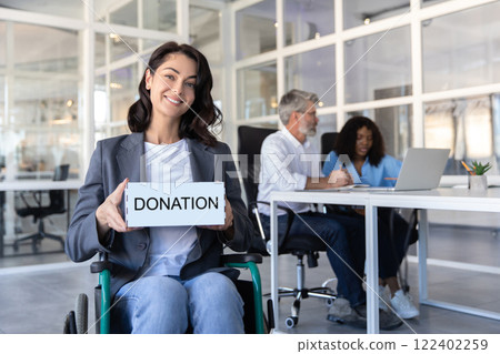 Disabled handicapped businesswoman asking donation for peoples with disabilities Disabled handicapped businesswoman asking donation for peoples with disabilities 122402259