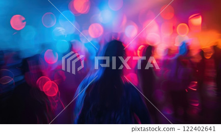 The blur of music lights and people comes together to create an unforgettable sensory experience 122402641