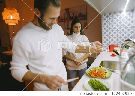 Spend a Delightful and Cozy Evening Cooking Together in an Exquisite Modern Kitchen Space 122402930