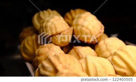 Delicious classic large cookies filled with sweet condensed milk, close-up of traditional homemade dessert on a plate, perfect for holiday treats, rich flavor, soft texture, popular sweet snack Delicious classic large cookies filled with sweet condensed milk, close-up of traditional homemade dessert on a plate, perfect for holiday treats, rich flavor, soft texture, popular sweet snack 122403505