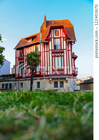 Striking half-timbered house with red and white Breton striped walls in La Rochelle, France 122403670