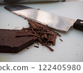Preparing homemade chocolate, chopping chocolate 122405980