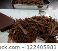 Preparing homemade chocolate, chopping chocolate 122405981