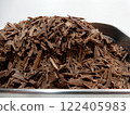 Preparing homemade chocolate, chopping chocolate 122405983