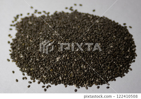 Pile of chia grains in white background. Still life.Vegetarian food 122410508