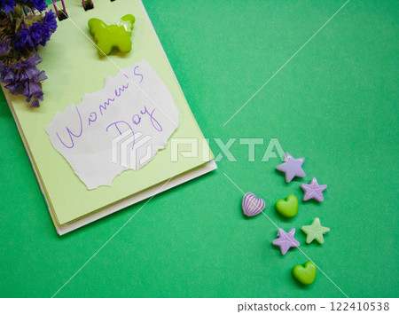 Planner with message for Women's Day with hearts, butterfly and flowers . Space for copying Planner with message for Women's Day with hearts, butterfly and flowers . Space for copying 122410538